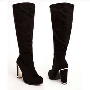 Torrid black knee high boots
